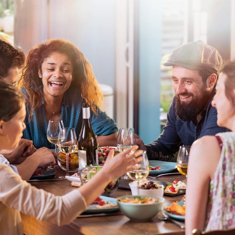 People having food and smiling