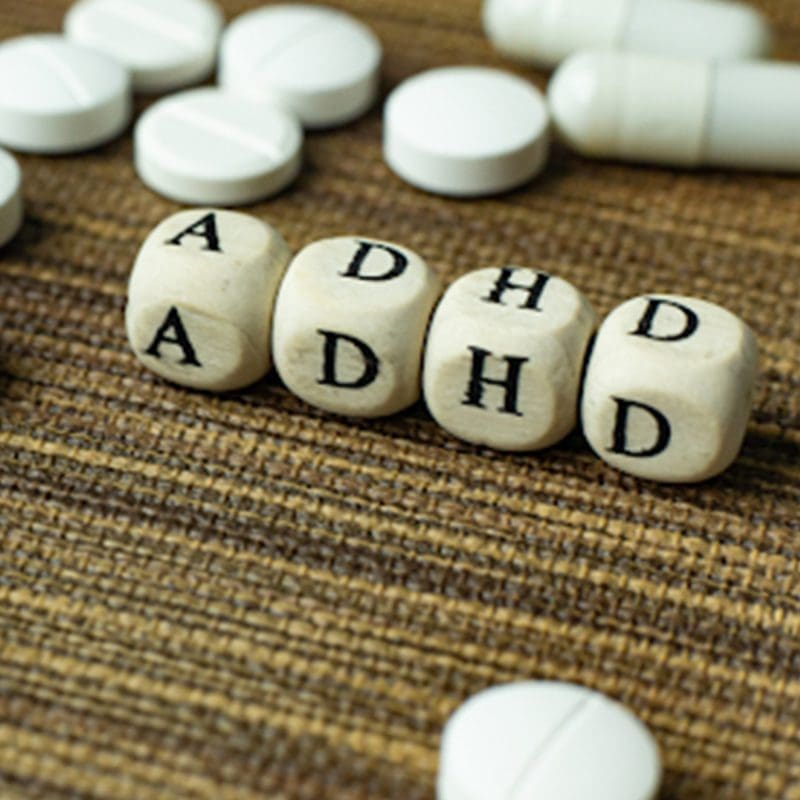 ADHD with pills on a table