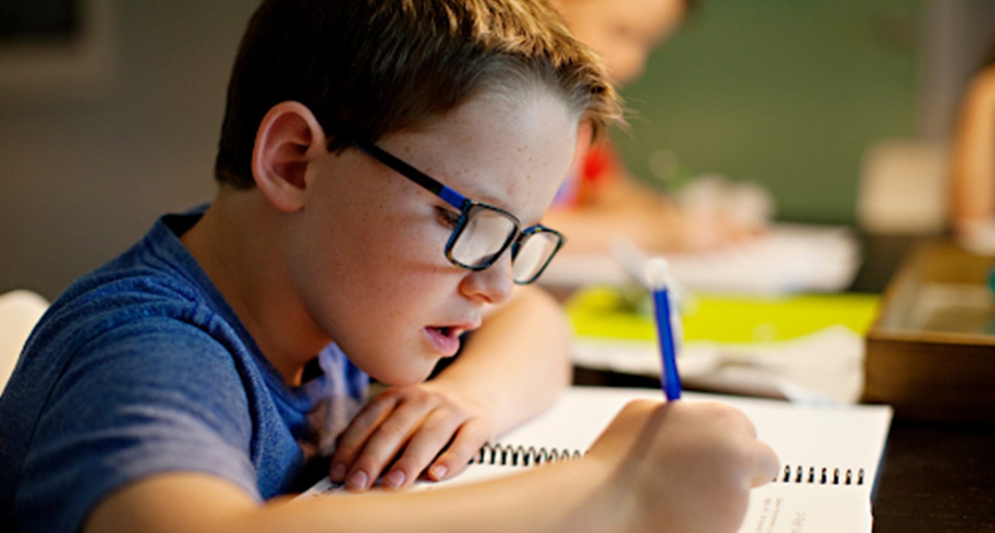 child working on homework