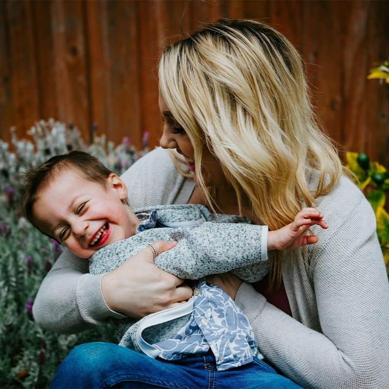 mom and son laughing