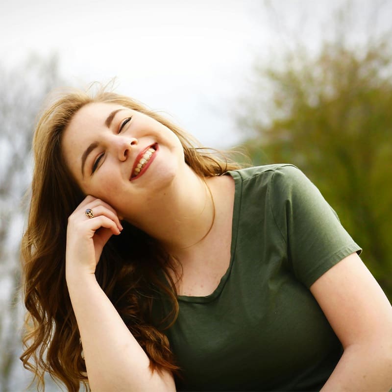 woman smiling outside