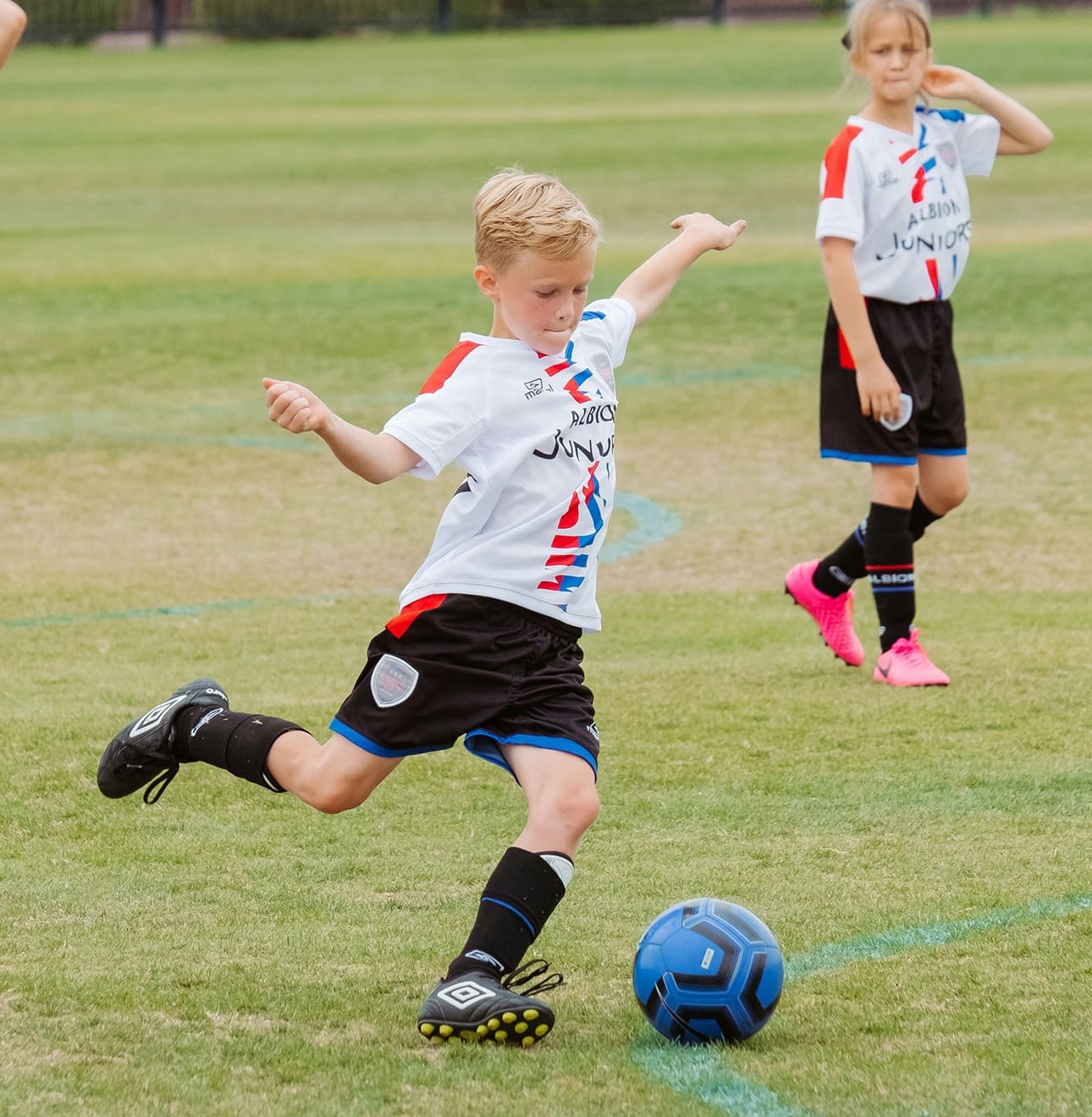 children playing soccer