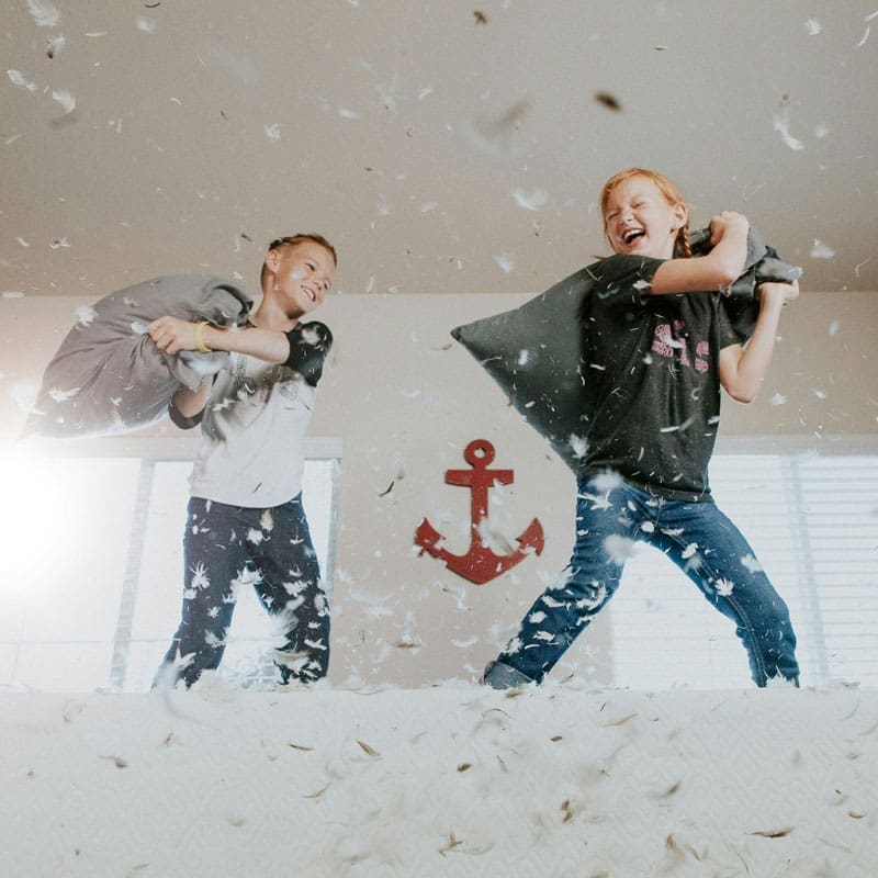 kids having a pillow fight