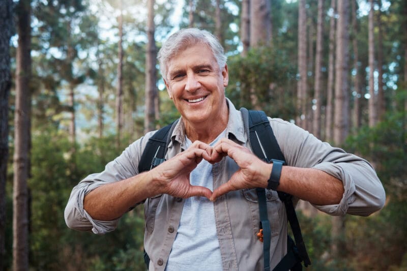 Older Man Making a Heart Gesture