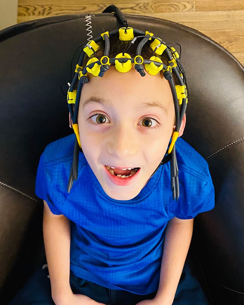 kid getting neurofeedback at Grey matters