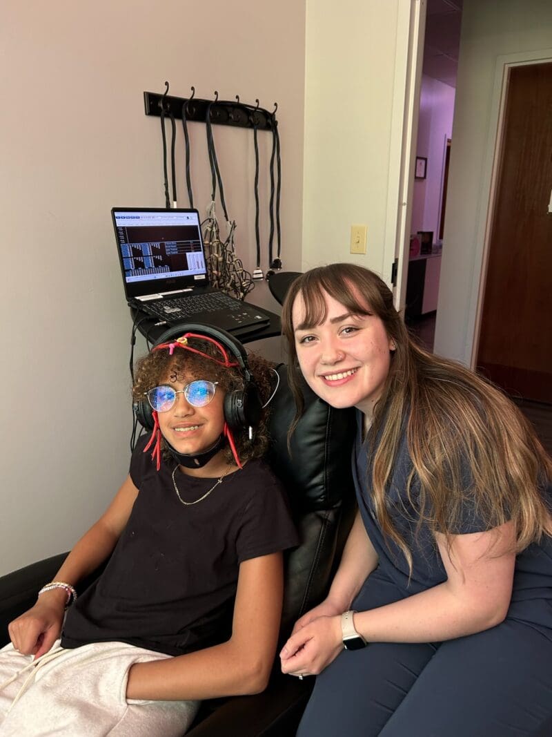 marissa and patient during neurofeedback session marissa and patient during neurofeedback session