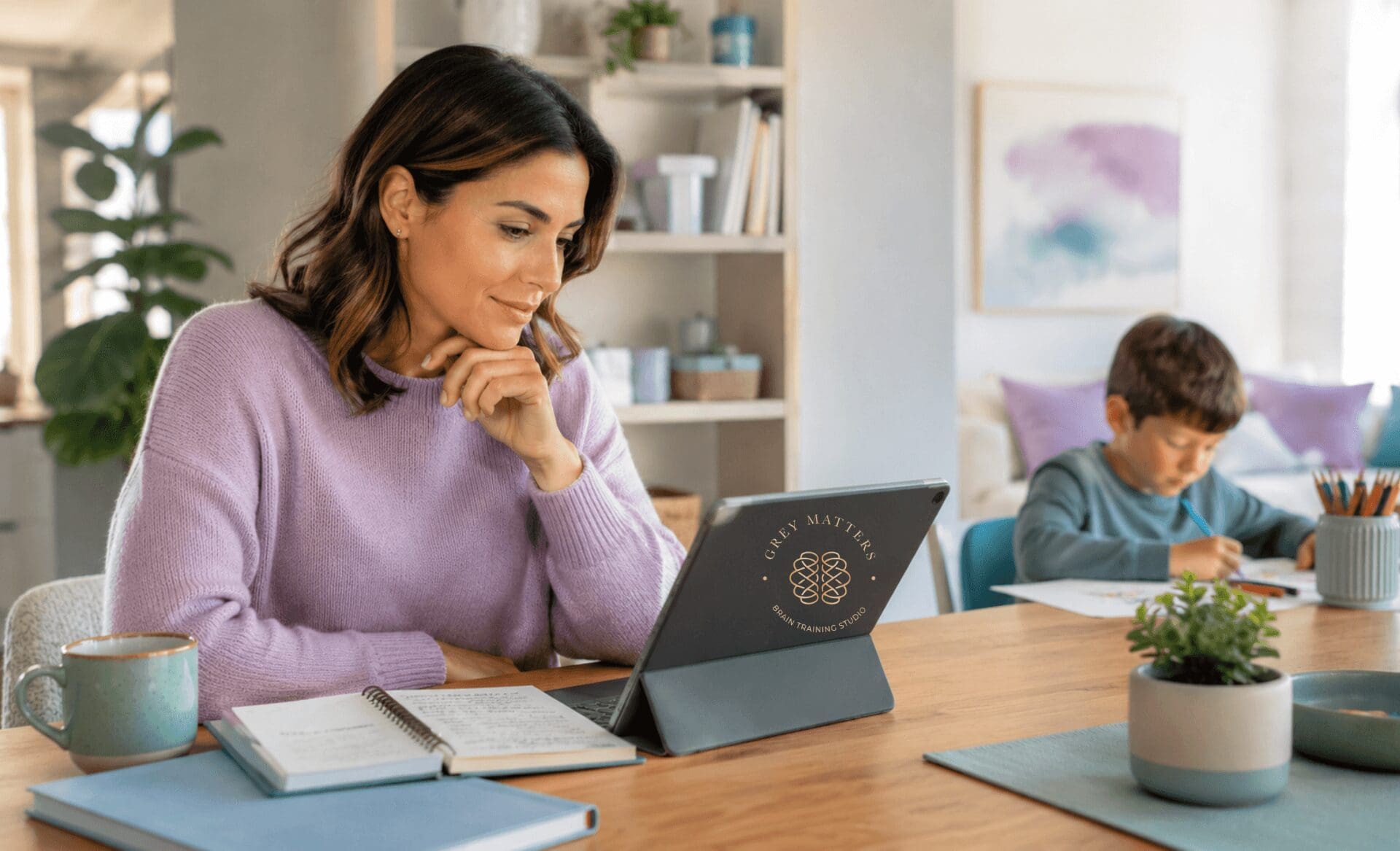 mom works on computer, son does his homework, high functioning autism