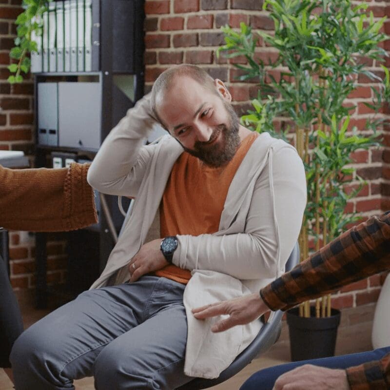 man-with-anger-management-issues-attending-aa-group-therapy-meeting-receive-support