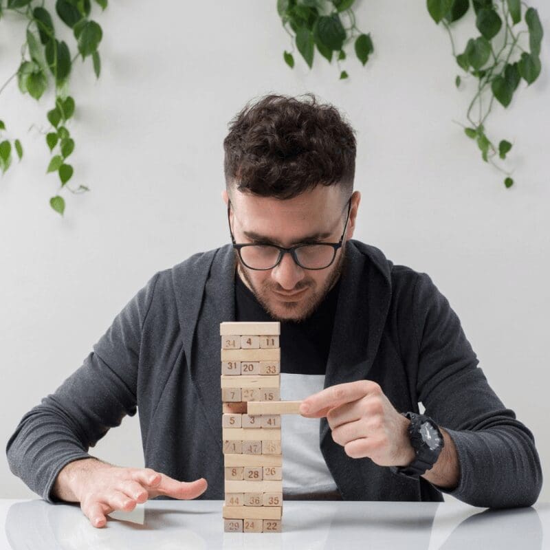 guy doing jigsaw puzzle to self-regulate